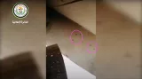 ثقوب أحدثتها طلقات من الذخيرة الحية في جدران المدرسة.