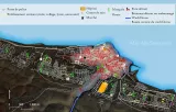Carte d'une ville côtière avec des lieux importants marqués, dont un hôpital et une mosquée.