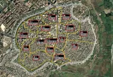 Cette image représente une carte d'une ville, montrant différents quartiers ou zones numérotés. Chaque numéro, comme 01, 04, et 14, est associé à un nom de lieu ou un quartier, comme "Camı-Ineb" et "Süleyman Nazif". Les contours de la ville sont également visibles, ainsi que les routes et les aménagements urbains environnants. La carte semble fournir une vue d'ensemble structurée de l'urbanisme de la région.