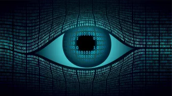 The image features a large, stylized eye at the center, which is depicted with a dark circle for the pupil. Surrounding the eye is a swirling pattern of binary code, composed of zeros and ones, creating a digital or technological theme. The overall color scheme includes shades of blue, giving it a futuristic and tech-inspired appearance. The binary code adds to the concept of data, surveillance, or digital awareness.